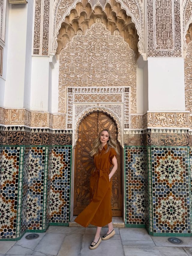 Luxury travel advisor Eva Szoradi at the zellige-tiled Ben Youssef Madrasa in Marrakech.