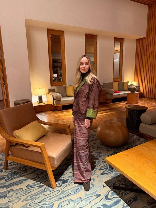 Luxury travel advisor Eva Szoradi wearing a traditional Bhutanese kira at Six Senses Thimphu, Bhutan. Luxury travel advisor Eva Szoradi wearing a traditional Bhutanese kira at Six Senses Thimphu, Bhutan.
