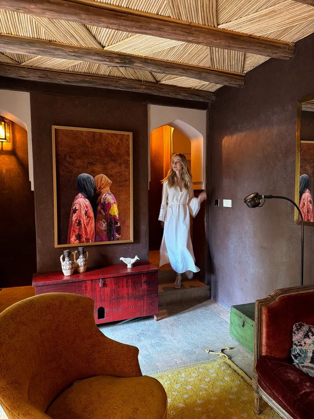 Luxury travel advisor Eva Szoradi in a kasbah suite near the Agafay Desert, Marrakech.